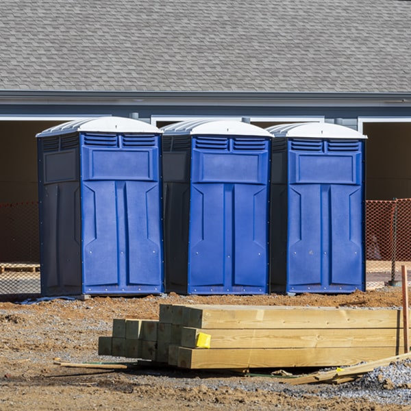 what is the maximum capacity for a single portable toilet in Woodsville